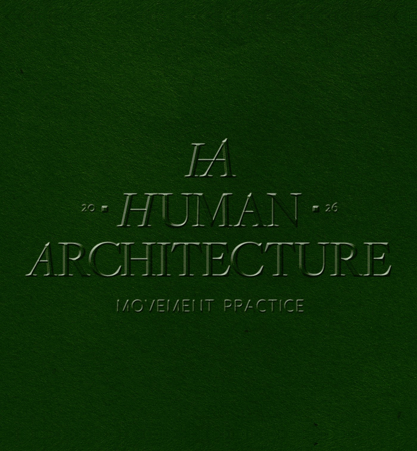 Embossed Human Architecture lockup on green paper